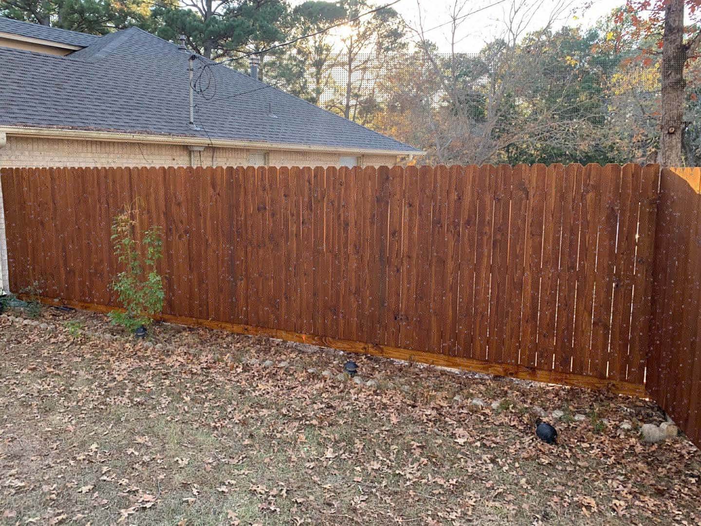 Prestaining wood fences decks pergolas and other outdoor structures in Bastrop Texas